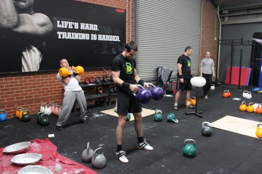 Double kettlebell clean